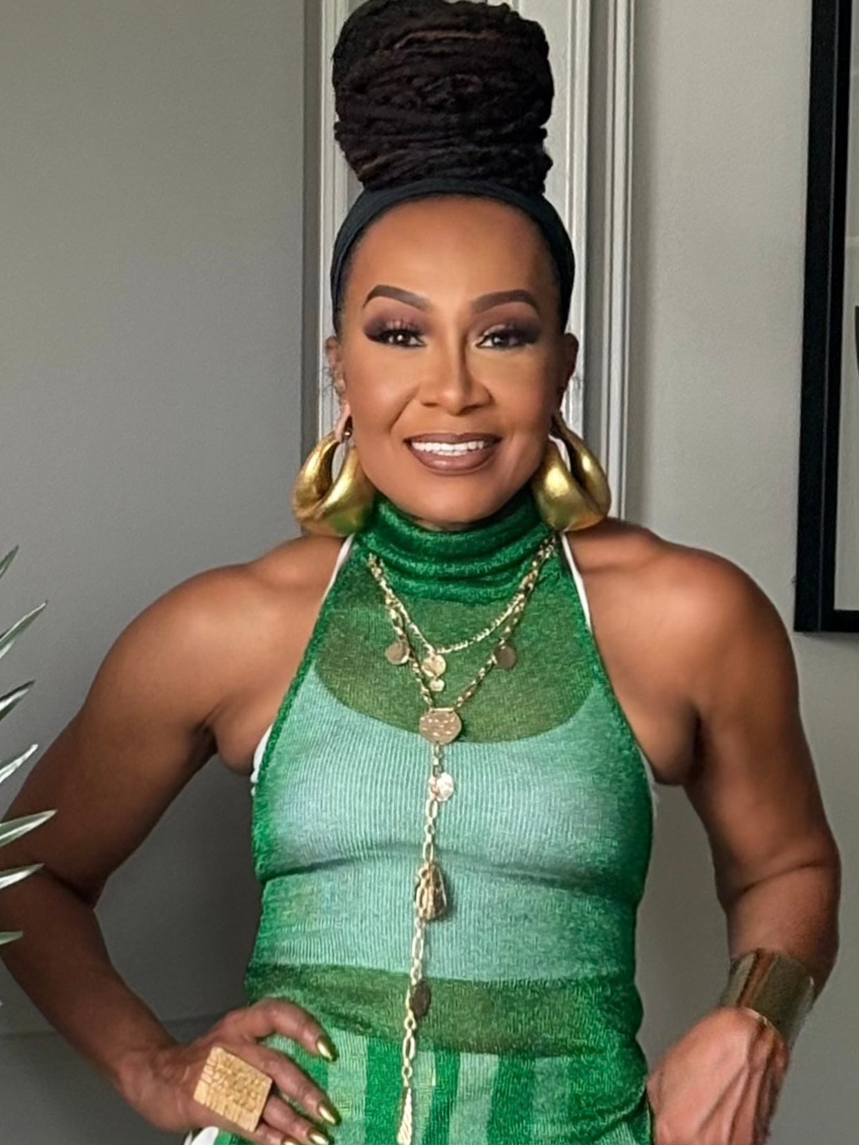 THE EMERALD GLOW HALTER TOP